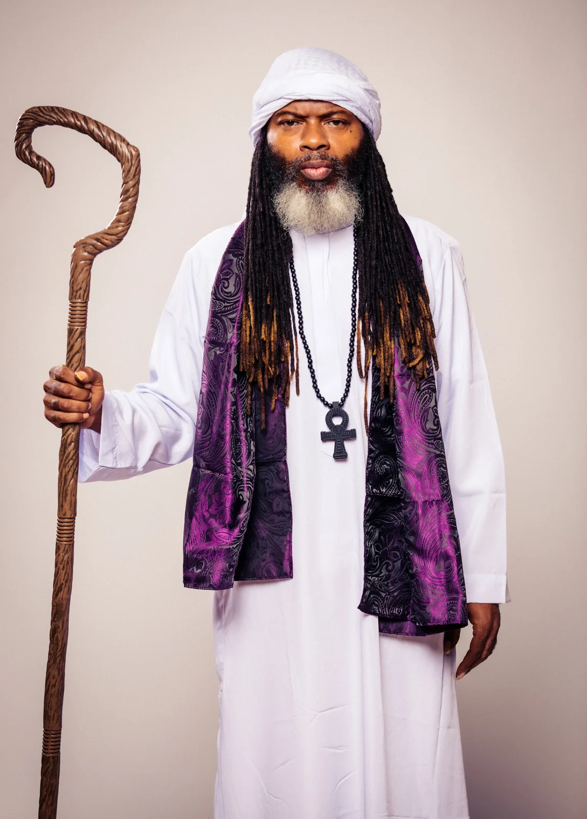 CITYSLIC THE OG portrait with his wooden staff