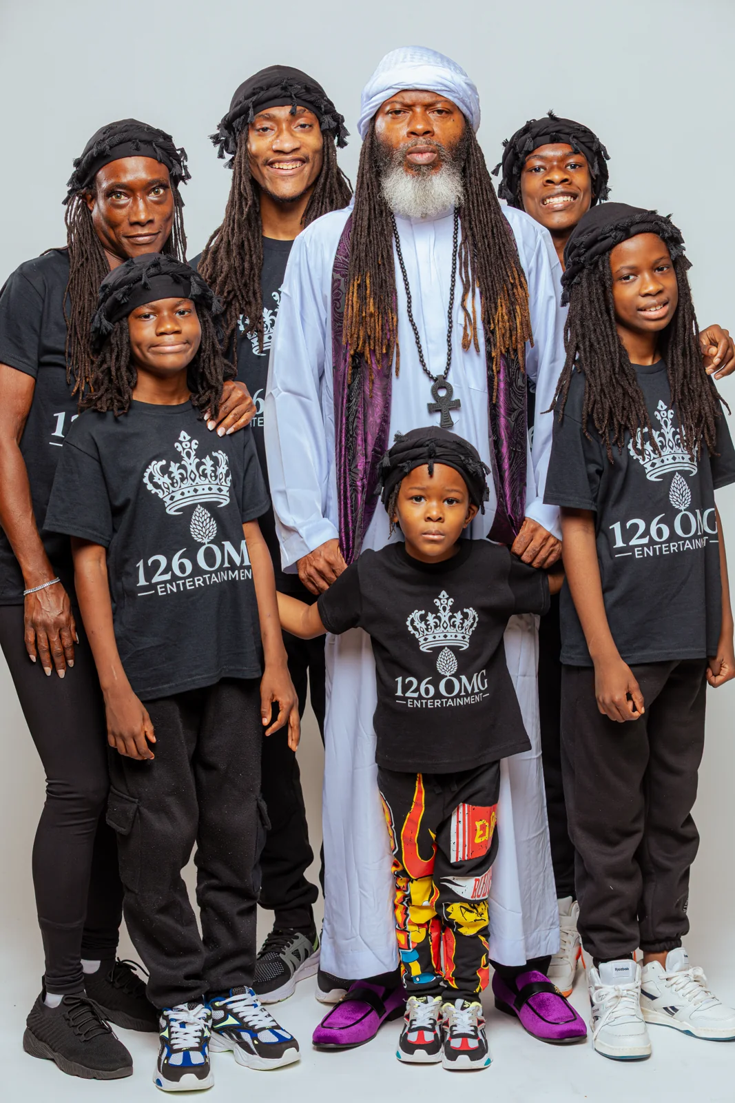 CITYSLIC THE OG, ELA OMG, and five of his sons, the 126 OMG Entertainment family
